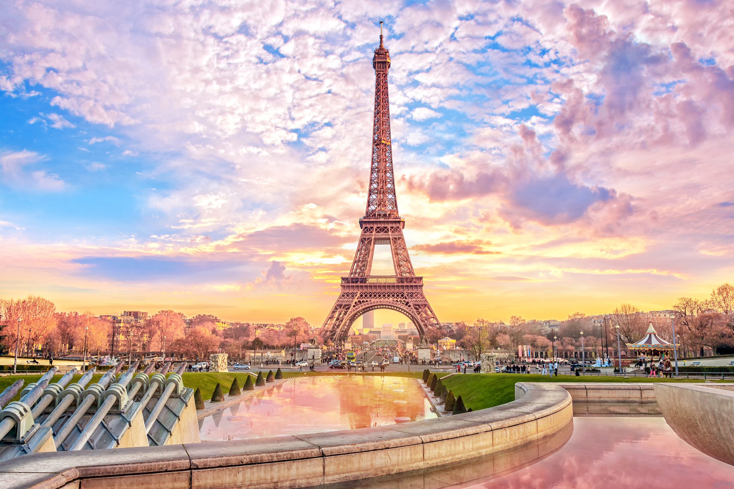 Eiffel Tower at sunset in Paris, France. Romantic travel backgro